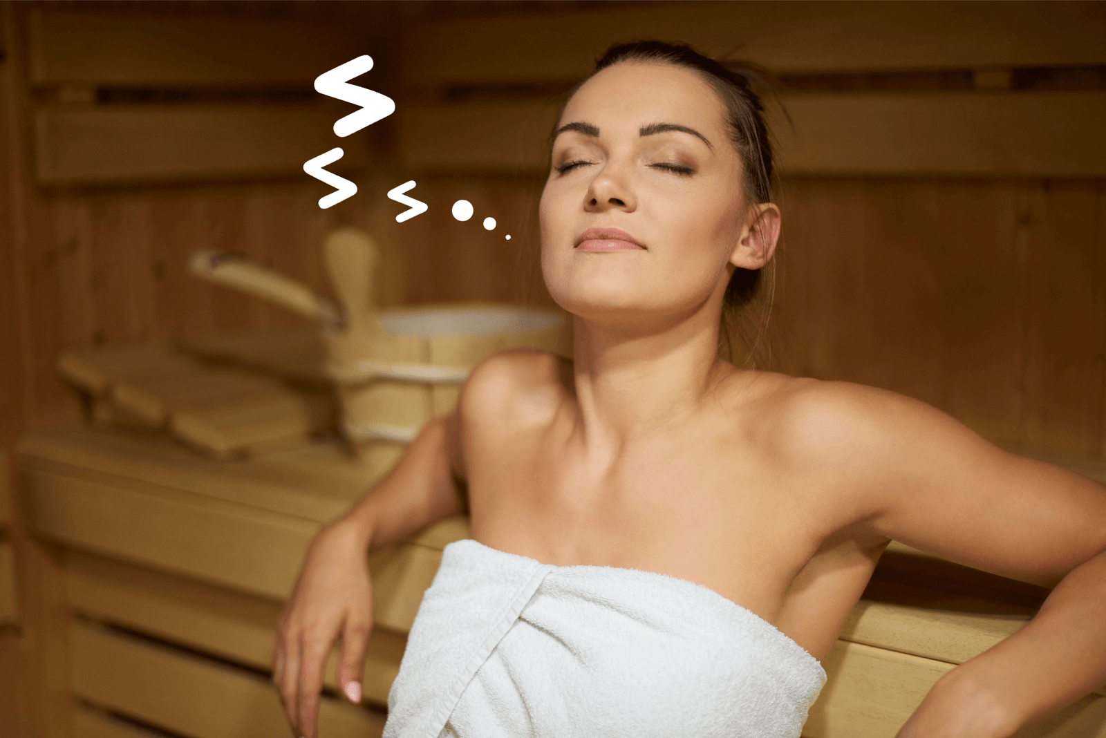 Person is relaxing in a sauna. 
Sauna benefits after workout.